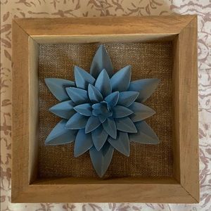 Blue flower accents behind burlap